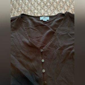 Cece woman’s black top with black buttons 1x